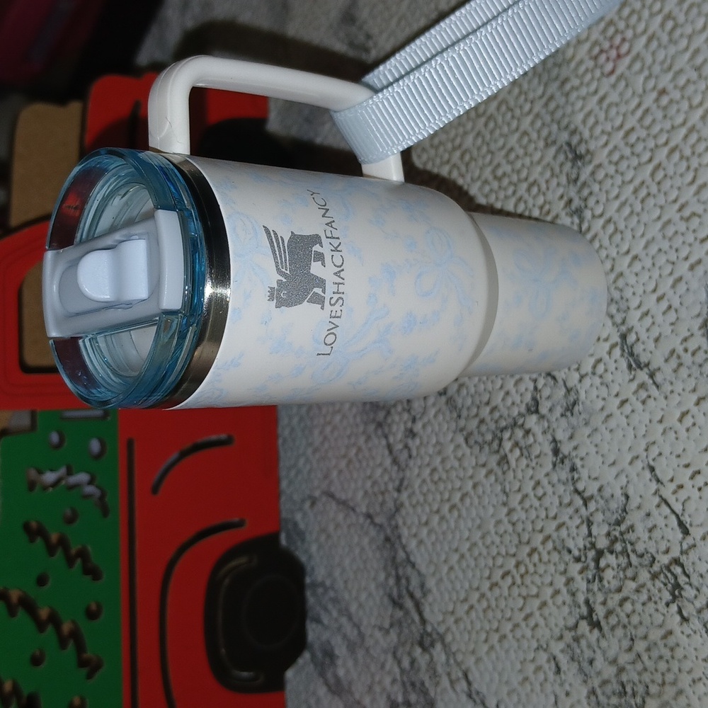 LoveShackFancy Cream and Blue Stanley Ornament. PRICE FIRM